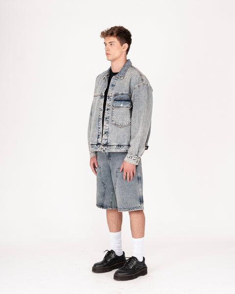 DENIM TRUCKER JACKET IN TINTED WASH