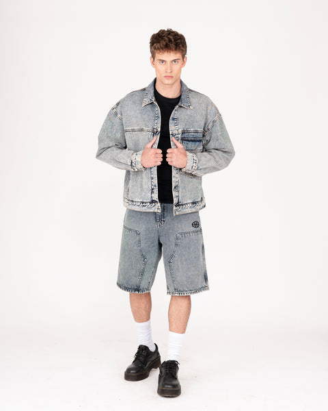 DENIM TRUCKER JACKET IN TINTED WASH