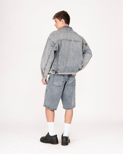 DENIM TRUCKER JACKET IN TINTED WASH