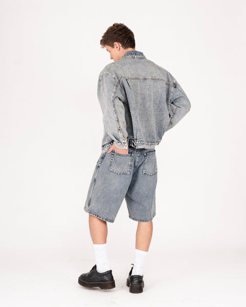 DENIM TRUCKER JACKET IN TINTED WASH