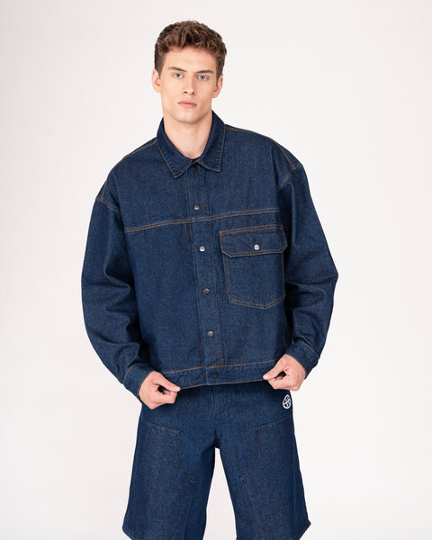 DENIM TRUCKER JACKET IN INDIGO