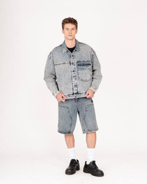 DENIM TRUCKER JACKET IN TINTED WASH