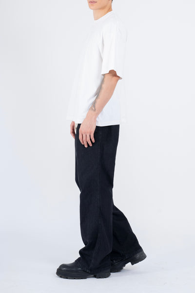 RELAXED DENIM FLARED PANTS IN STONE WASHED