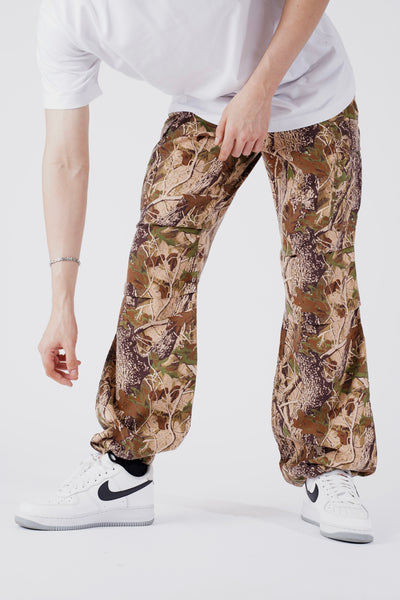 FLARED PANTS IN FOREST CAMOU