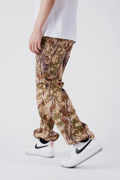 FLARED PANTS IN FOREST CAMOU
